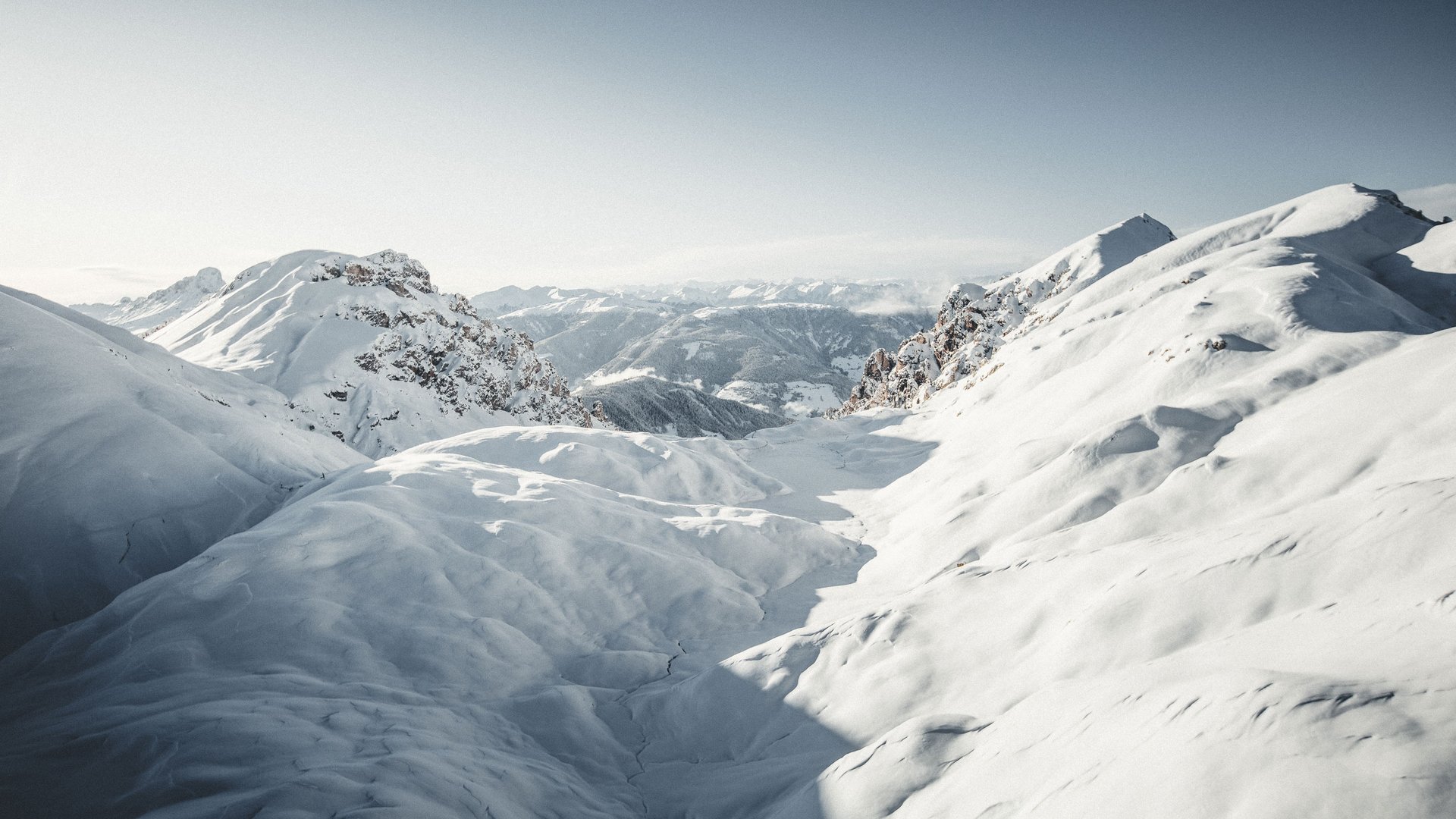 The best hotel at Plan de Corones/Kronplatz Snow-covered mountain landscape under clear sky
