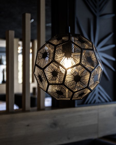 Our current catalogue for downloading Modern pendant light with geometric pattern in a dark room