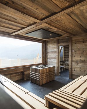 Bruneck: shopping & more Modern sauna with large window and mountain view